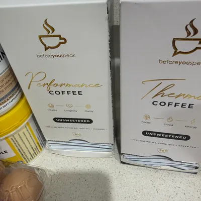 Customer-uploaded Performance Coffee and Thermo Coffee boxes on a kitchen counter