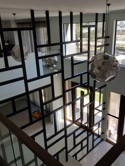 Black satin room divider finished in 2 PAC in one of our projects