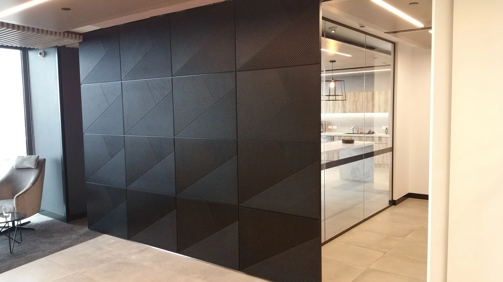 Black architectural wall panels finished for a commercial interior
