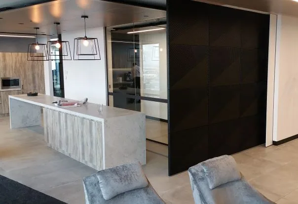 Black 2 PAC wall panels in an office fit-out project