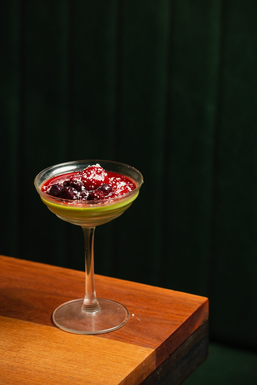 A cocktail served up in a coupe glass