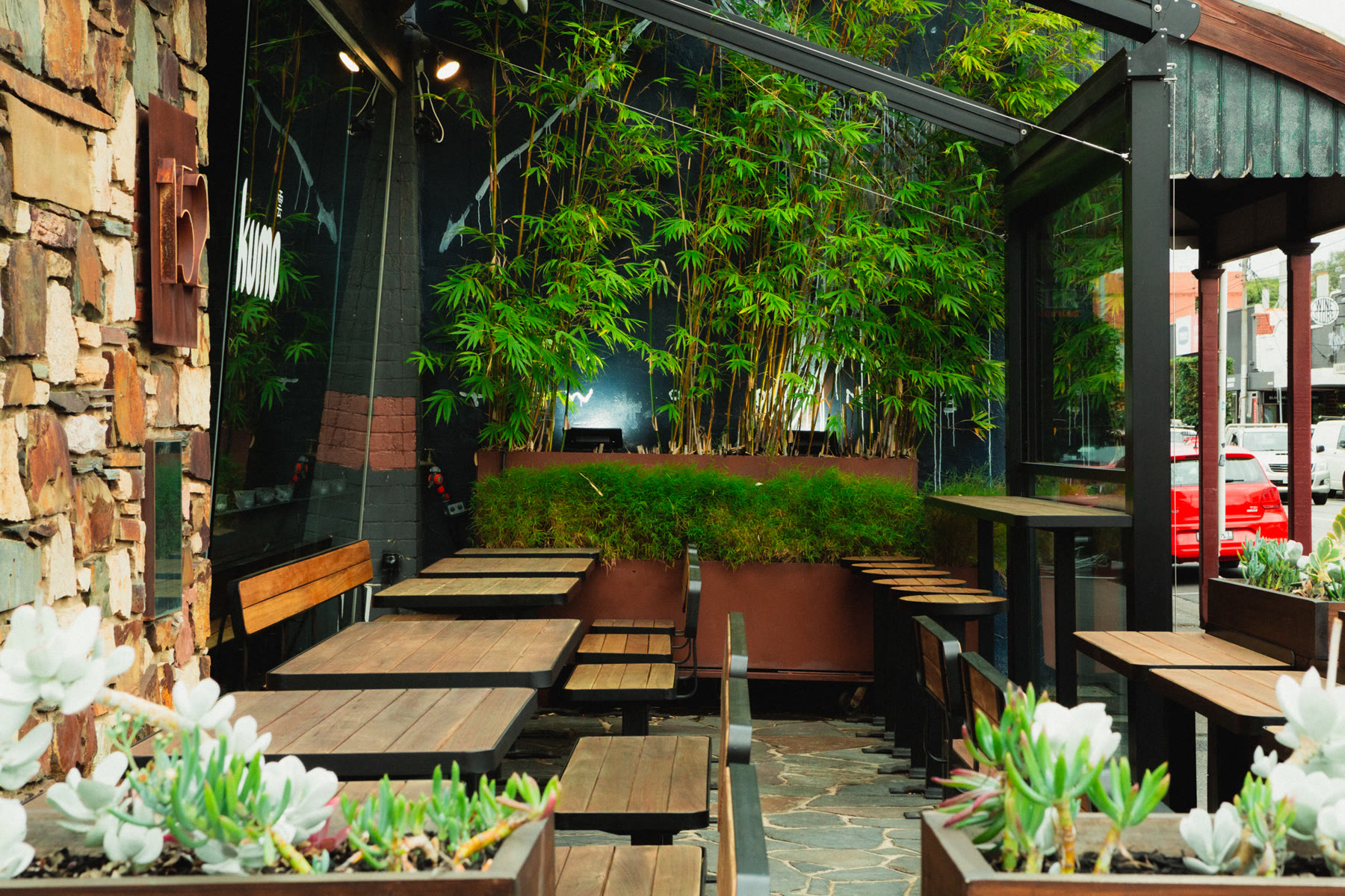The bamboo-lined outdoor patio