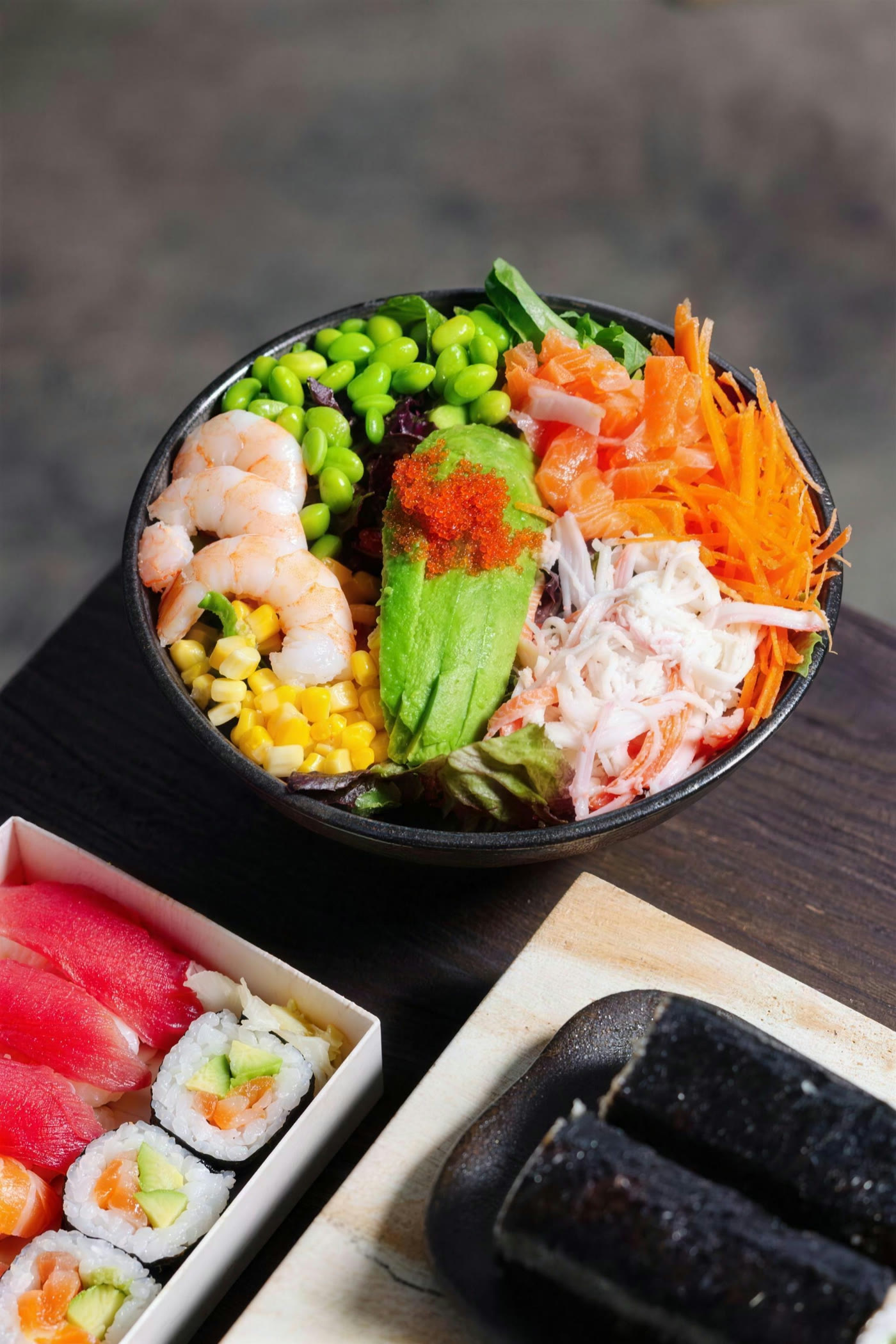 Poke bowl with prawns, edamame, avocado and carrot